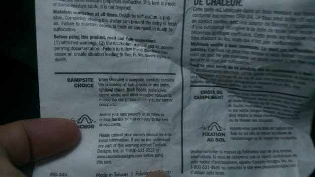 The warning label I read for the first time whilst manually bracing my tent against the wind!